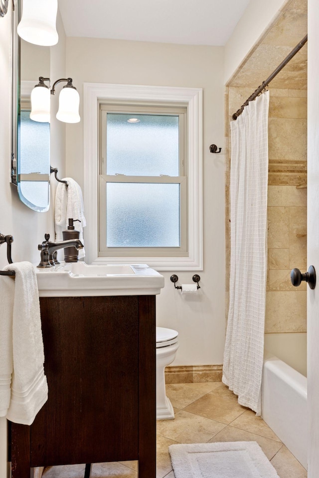 4024 Quentin Ave, Saint Louis Park, MN 55416 - full bath featuring vanity, shower / tub combo with curtain, and tile patterned floors