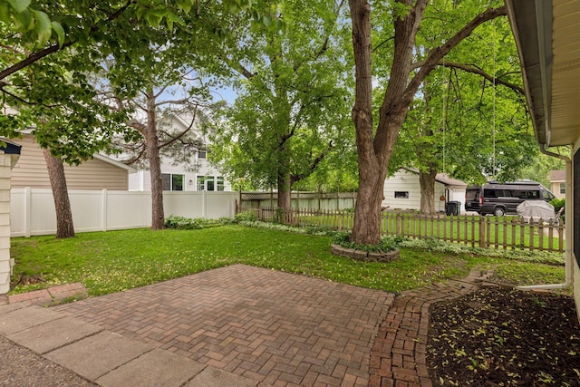4024 Quentin Ave, Saint Louis Park, MN 55416 - fenced backyard featuring a patio