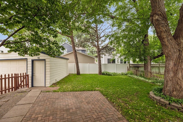 4024 Quentin Ave, Saint Louis Park, MN 55416 - fenced backyard with a patio, an outdoor structure, and a garage