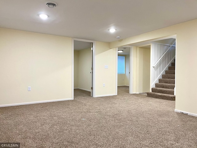 finished basement with recessed lighting, baseboards, carpet floors, and stairs