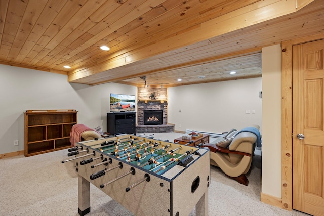 recreation room featuring a fireplace, wood ceiling, baseboards, and recessed lighting