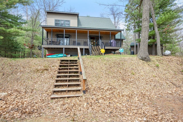 back of house with stairway