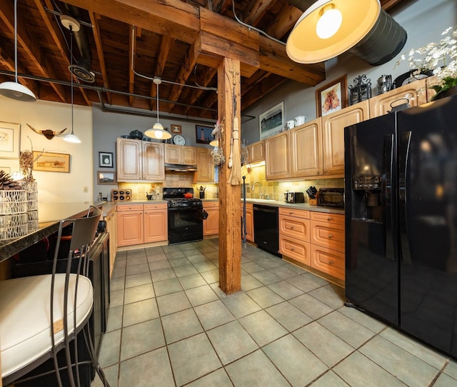702 1st St Unit 521, Minneapolis, MN 55401 - kitchen featuring decorative backsplash, light brown cabinetry, light tile patterned floors, black appliances, and a sink
