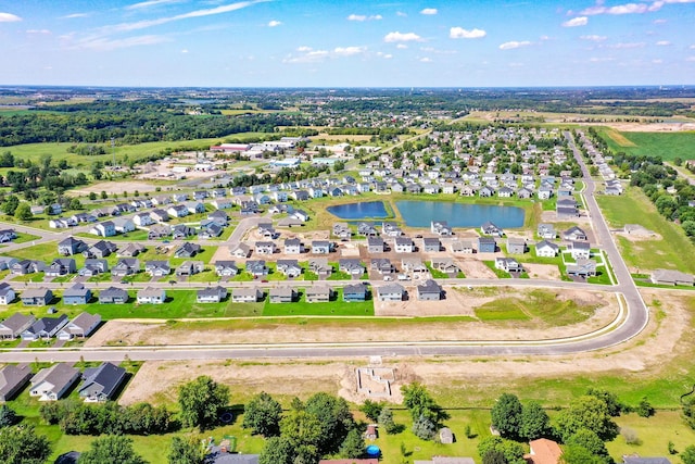 aerial view featuring a residential view and a water view