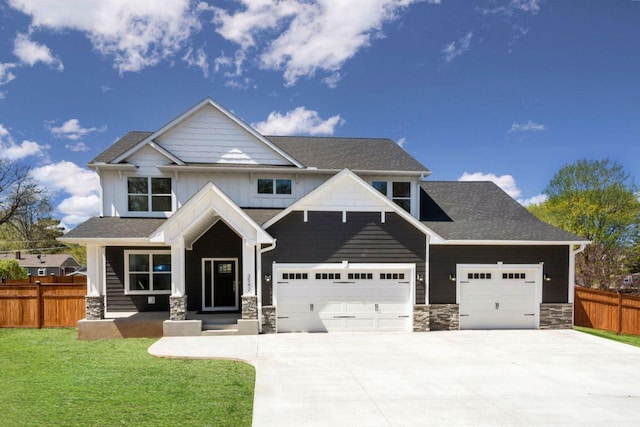 3542 Leroy St, Deephaven, MN 55391 - craftsman inspired home featuring concrete driveway, stone siding, an attached garage, and a shingled roof