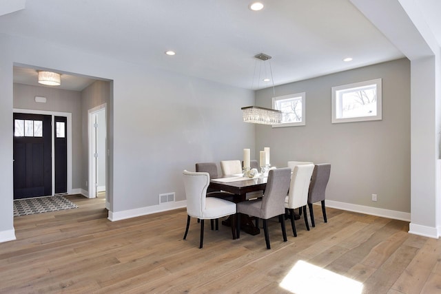 3542 Leroy St, Deephaven, MN 55391 - dining space with wood finished floors, baseboards, and recessed lighting