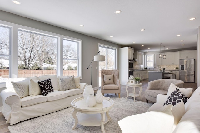 3542 Leroy St, Deephaven, MN 55391 - living room with recessed lighting, wood finished floors, and baseboards