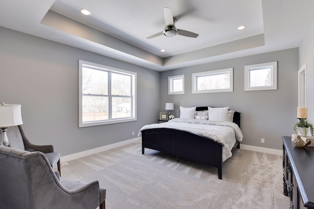 3542 Leroy St, Deephaven, MN 55391 - bedroom featuring a raised ceiling, multiple windows, baseboards, light carpet, and recessed lighting