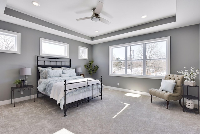 3542 Leroy St, Deephaven, MN 55391 - carpeted bedroom featuring baseboards, multiple windows, recessed lighting, a ceiling fan, and a raised ceiling