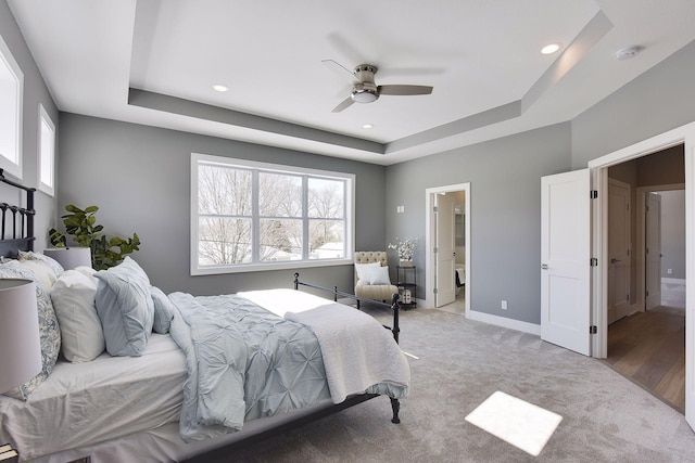 3542 Leroy St, Deephaven, MN 55391 - bedroom with a tray ceiling, multiple windows, light colored carpet, a ceiling fan, and recessed lighting