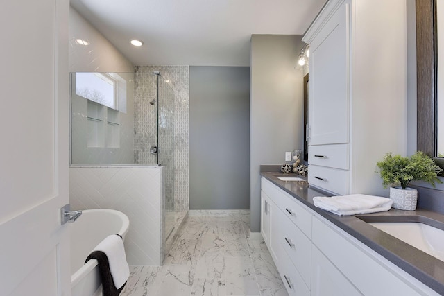 3542 Leroy St, Deephaven, MN 55391 - full bathroom with walk in shower, a soaking tub, double vanity, marble finish flooring, and recessed lighting