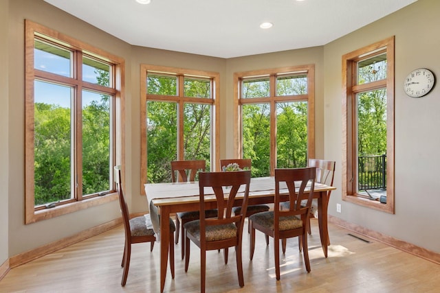 1656 Isabella Pkwy, Chaska, MN 55318 - dining area featuring baseboards, light wood-type flooring, and recessed lighting