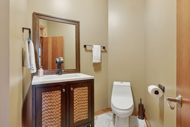 1656 Isabella Pkwy, Chaska, MN 55318 - half bath featuring marble finish floors, vanity, toilet, and baseboards