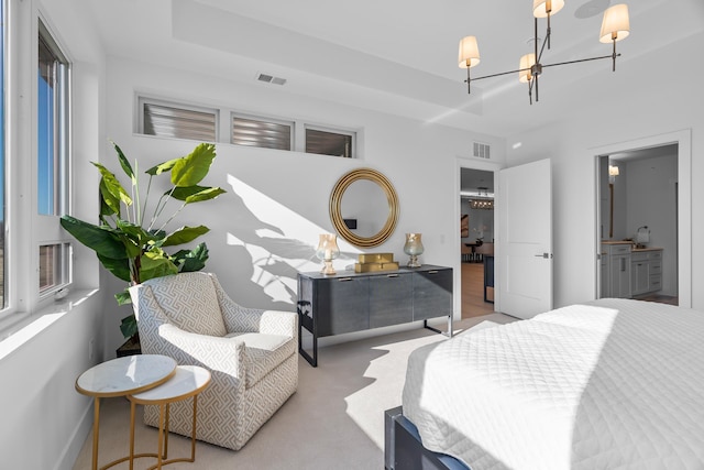 bedroom featuring visible vents, carpet, baseboards, and a notable chandelier