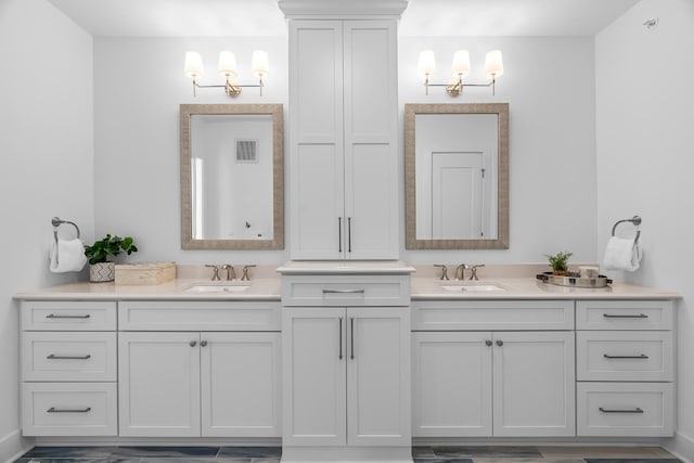 full bath with vanity and visible vents