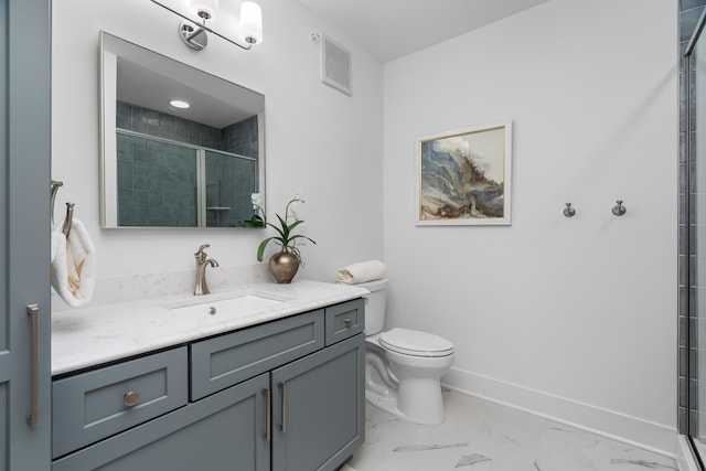 full bath with visible vents, vanity, marble finish floor, toilet, and a stall shower