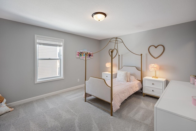bedroom featuring baseboards and light colored carpet
