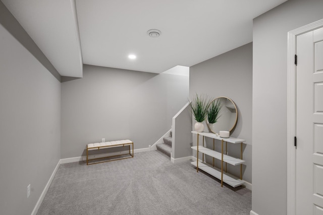 interior space featuring baseboards, recessed lighting, and carpet floors
