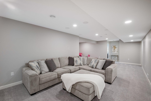 living room with recessed lighting, carpet flooring, and baseboards