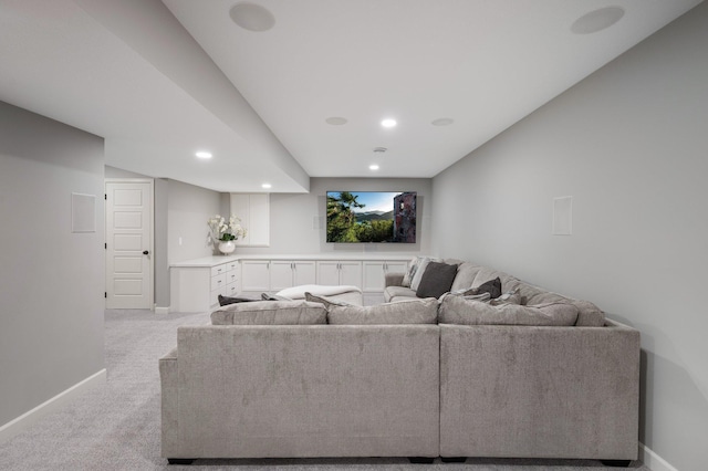 living area with baseboards, carpet flooring, and recessed lighting