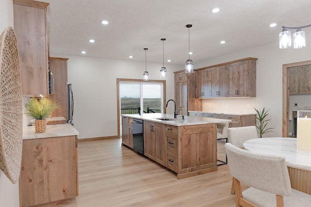 kitchen featuring a sink, recessed lighting, black dishwasher, and light wood-type flooring