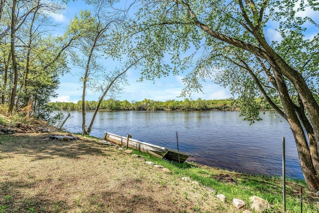 9158 Collins Dr NW, Ramsey, MN 55303 - water view featuring a dock