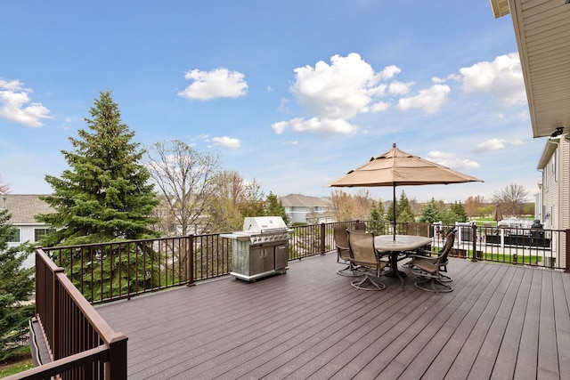 2919 Hilltop Dr, Chaska, MN 55318 - wooden terrace with outdoor dining space and area for grilling