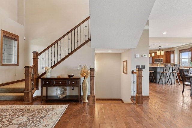 2919 Hilltop Dr, Chaska, MN 55318 - staircase with hardwood / wood-style floors and baseboards