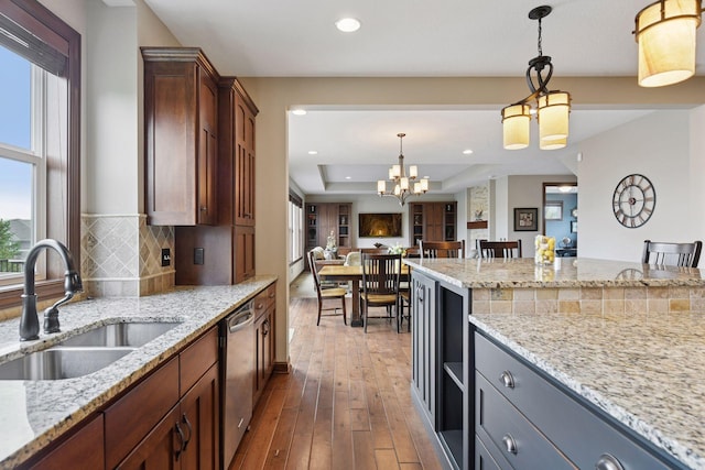 2919 Hilltop Dr, Chaska, MN 55318 - kitchen featuring a sink, plenty of natural light, dishwasher, open floor plan, and recessed lighting