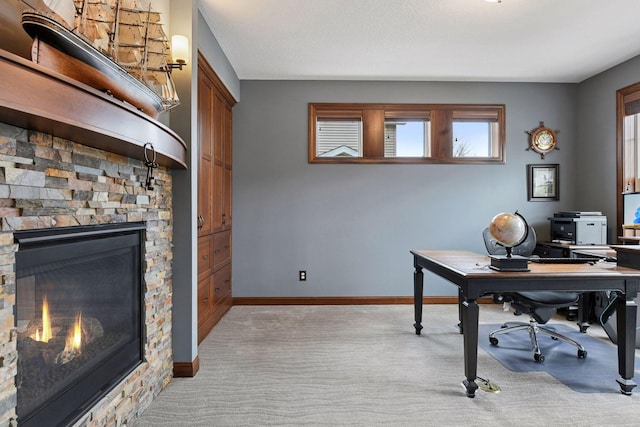 2919 Hilltop Dr, Chaska, MN 55318 - office featuring light colored carpet, plenty of natural light, a fireplace, and baseboards