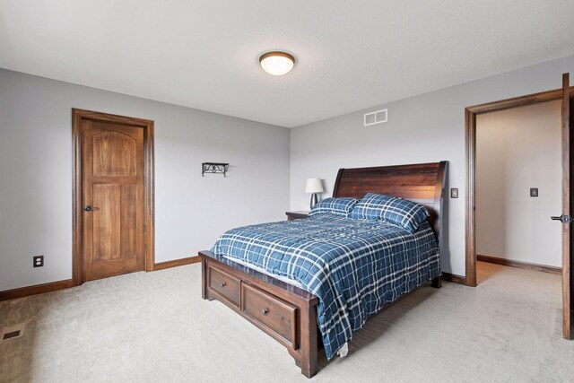 2919 Hilltop Dr, Chaska, MN 55318 - bedroom with light carpet and baseboards