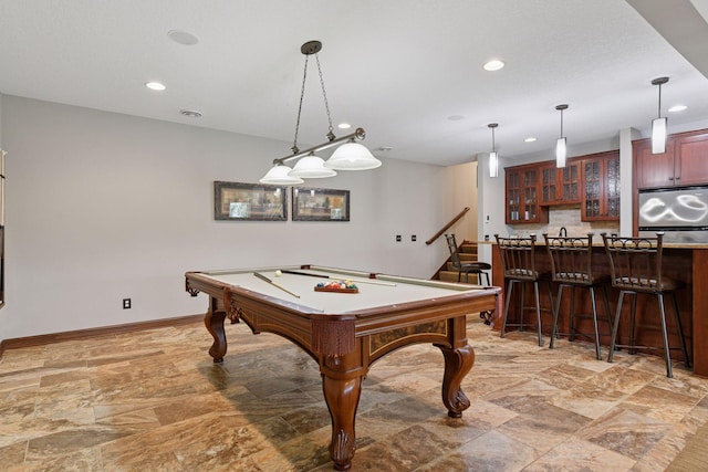 2919 Hilltop Dr, Chaska, MN 55318 - rec room with light stone finish floors, bar, recessed lighting, billiards table, and baseboards