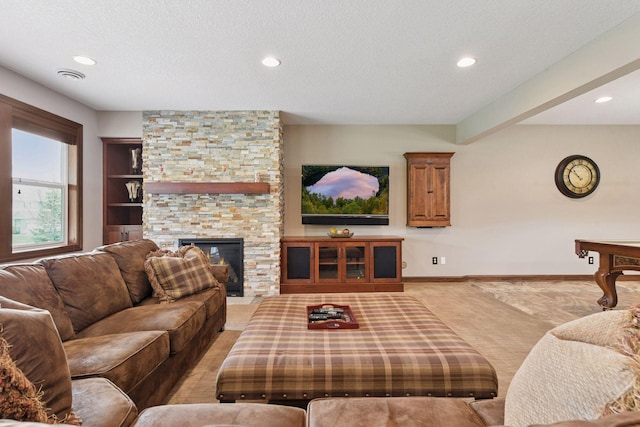 2919 Hilltop Dr, Chaska, MN 55318 - living area with a fireplace, recessed lighting, baseboards, light carpet, and a textured ceiling