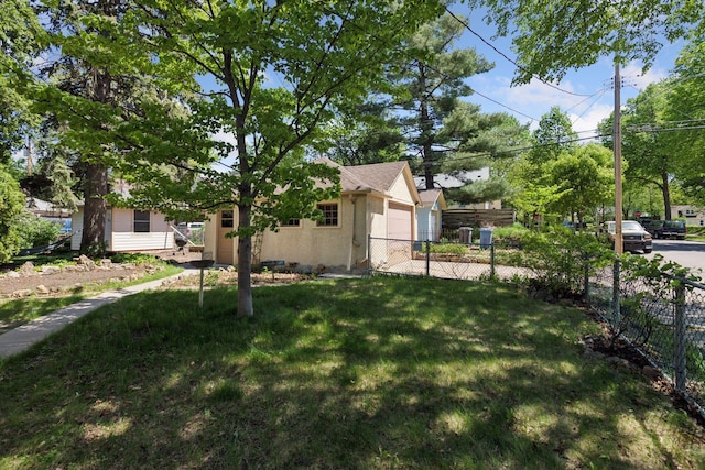 view of yard featuring a garage