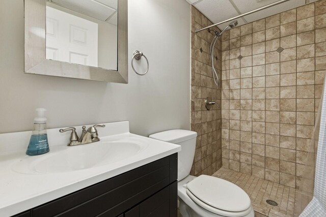full bathroom featuring vanity, toilet, and a stall shower