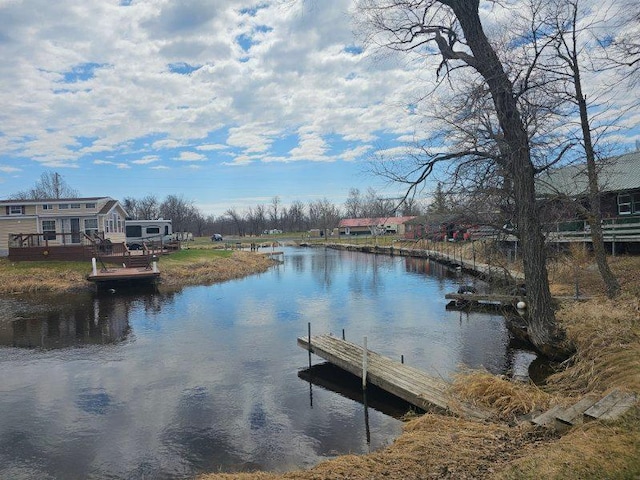 19675 Woody Ln NE, Kelliher, MN 56650 - view of dock featuring a water view