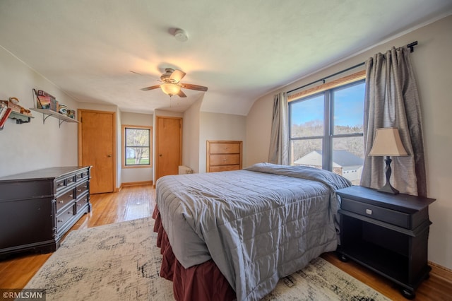 300 Carlson Rd, Cannon Falls, MN 55009 - bedroom featuring light wood finished floors and ceiling fan
