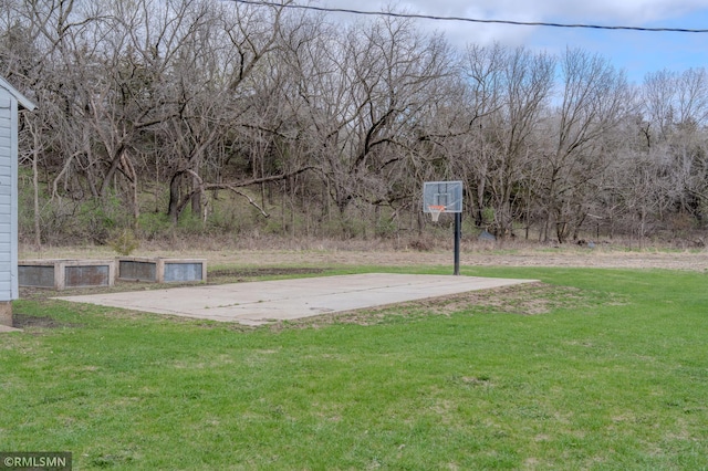 300 Carlson Rd, Cannon Falls, MN 55009 - view of sport court featuring a lawn