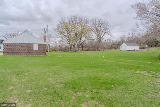 300 Carlson Rd, Cannon Falls, MN 55009 - view of yard featuring an outbuilding