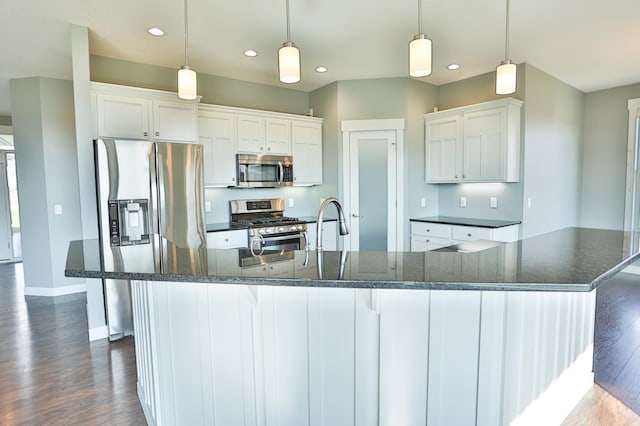 203 Walnut Hill Way, Troy Twp, WI 54022 - kitchen featuring stainless steel appliances, baseboards, recessed lighting, and dark wood finished floors