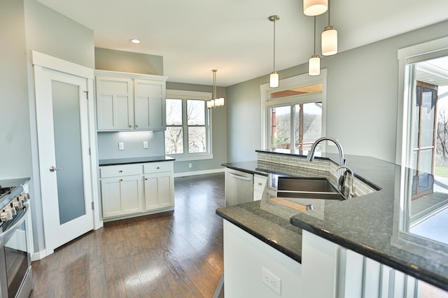 203 Walnut Hill Way, Troy Twp, WI 54022 - kitchen with appliances with stainless steel finishes, a sink, baseboards, white cabinets, and dark wood-style floors