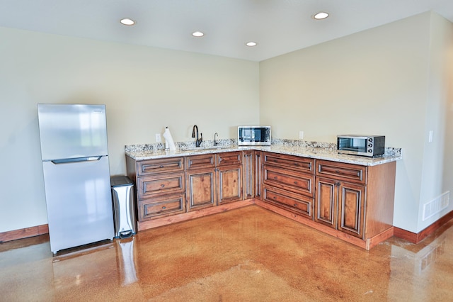 203 Walnut Hill Way, Troy Twp, WI 54022 - bar featuring recessed lighting, a sink, baseboards, and appliances with stainless steel finishes