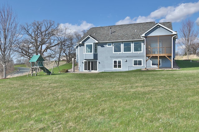 203 Walnut Hill Way, Troy Twp, WI 54022 - rear view of property featuring a playground and a yard