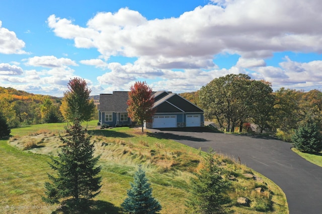 203 Walnut Hill Way, Troy Twp, WI 54022 - view of front of property with an attached garage and aphalt driveway