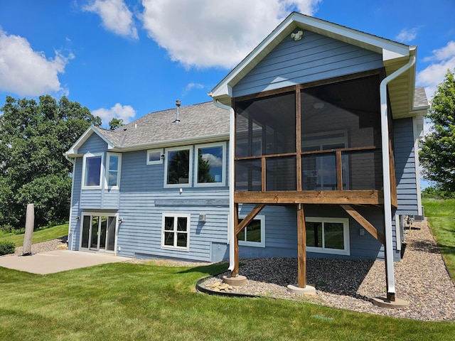 203 Walnut Hill Way, Troy Twp, WI 54022 - rear view of house with a patio area, a sunroom, a yard, and a shingled roof