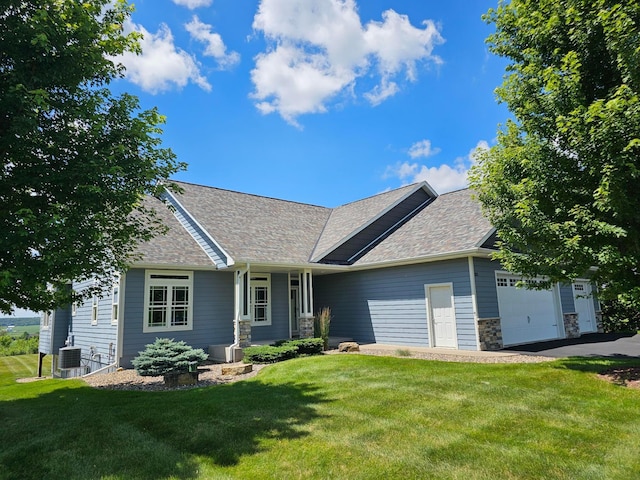 203 Walnut Hill Way, Troy Twp, WI 54022 - view of front of property with an attached garage, a front yard, stone siding, and a shingled roof