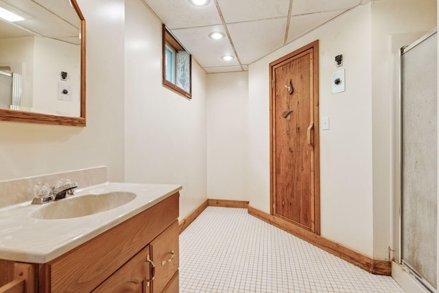 1433 Oldridge Ave N, West Lakeland Twp, MN 55082 - bathroom featuring vanity, a shower stall, baseboards, recessed lighting, and tile patterned flooring