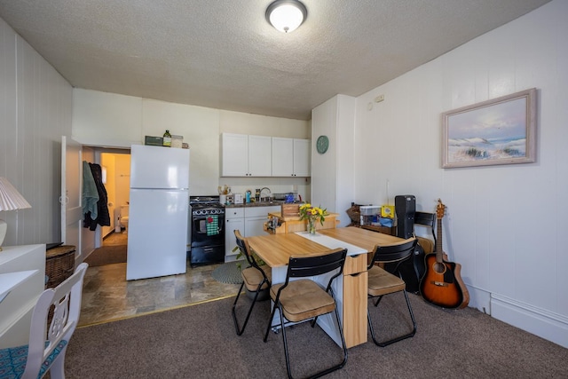606 11th St SE, Rochester, MN 55904 - dining area with a textured ceiling