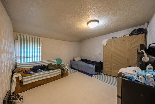 606 11th St SE, Rochester, MN 55904 - carpeted bedroom featuring a textured ceiling