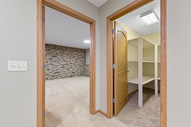 corridor with carpet floors